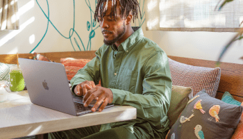 Customer contacting us from a warm, inviting café atmosphere