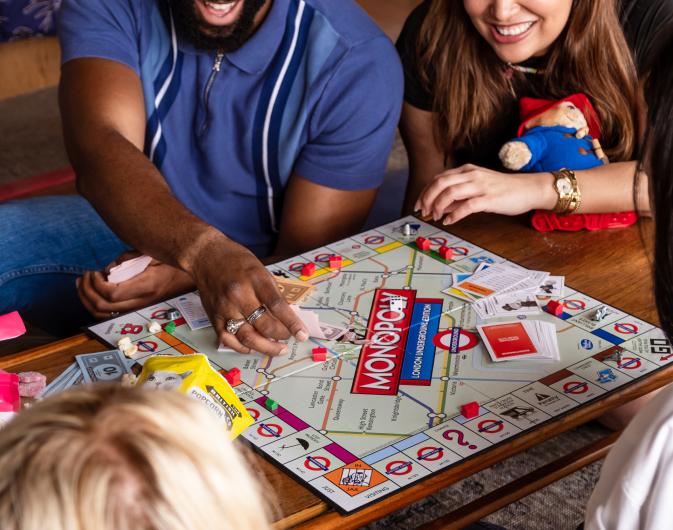 Friends playing monopoly