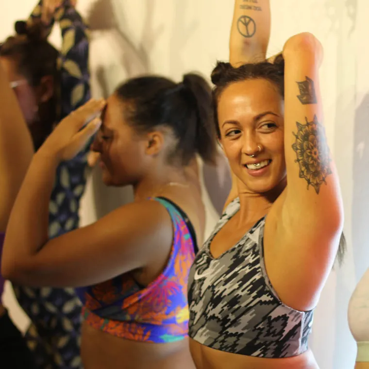 women doing yoga