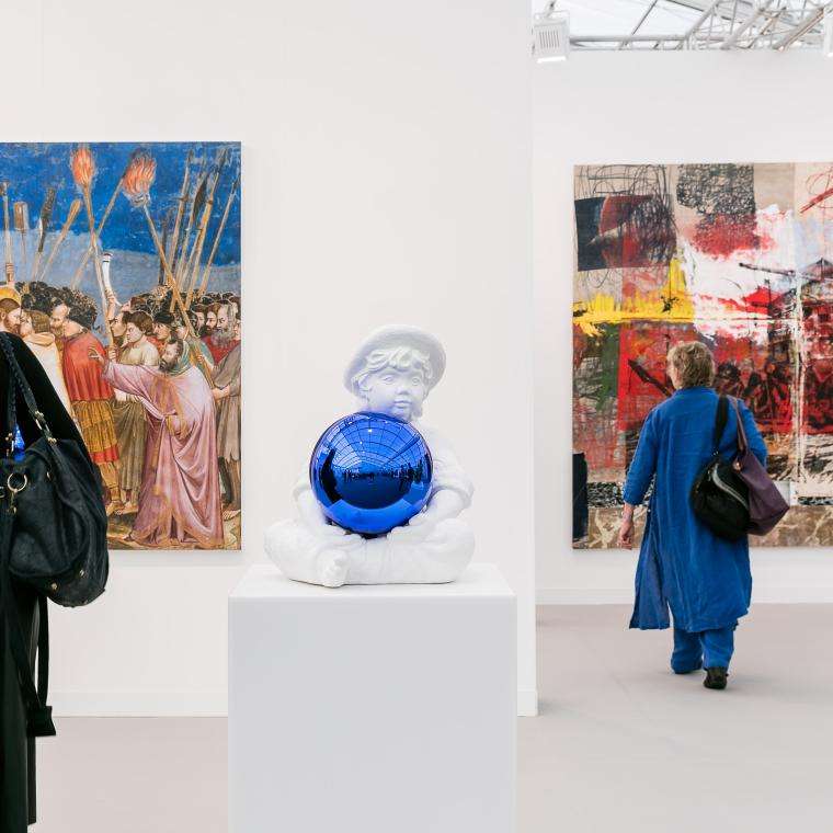 two women walking through Frieze Museum