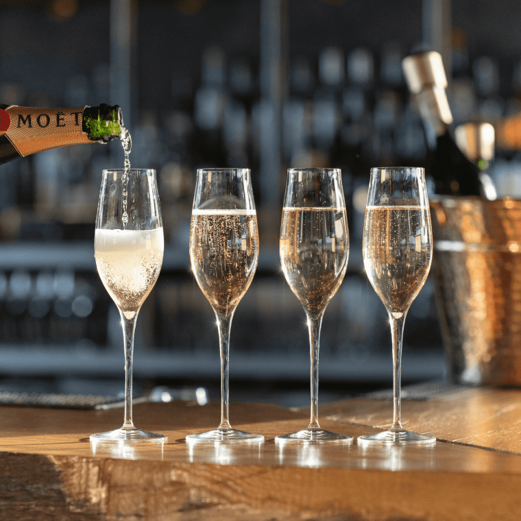 4 glasses of Moet Champagne