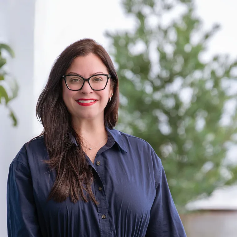 Michelle Montalvo standing at a table outside