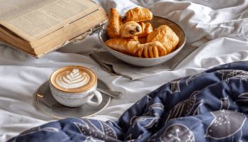 Breakfast in bed with a book